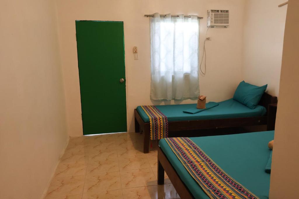 Postel nebo postele na pokoji v ubytování Garpeza Backpackers