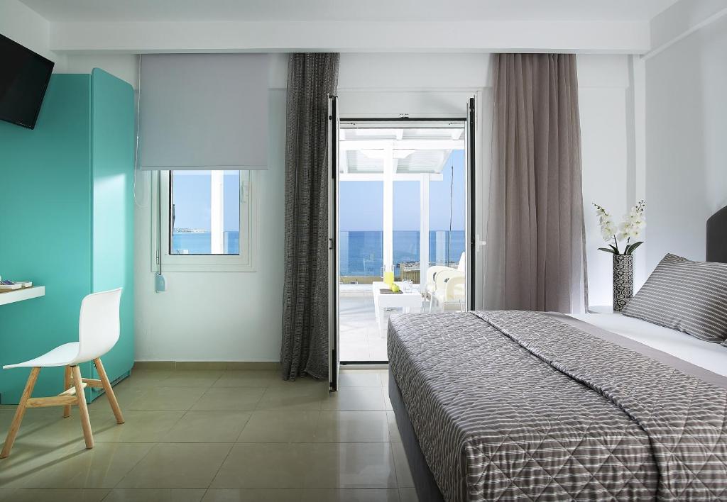 Posteľ alebo postele v izbe v ubytovaní Coral Hotel