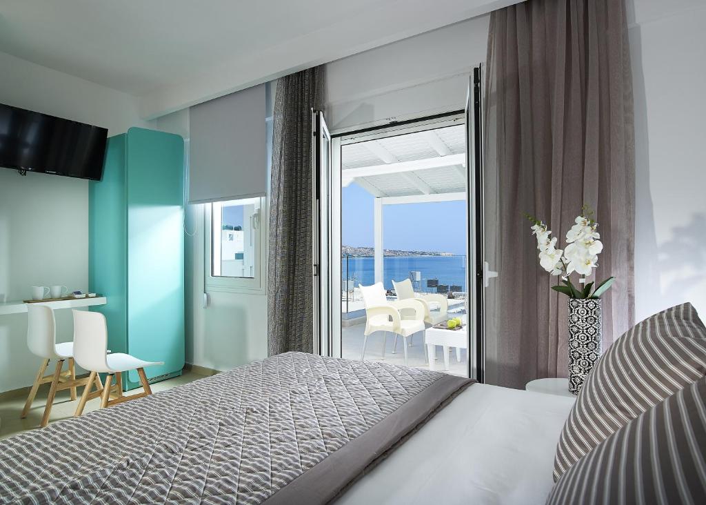 Кровать или кровати в номере Coral Hotel