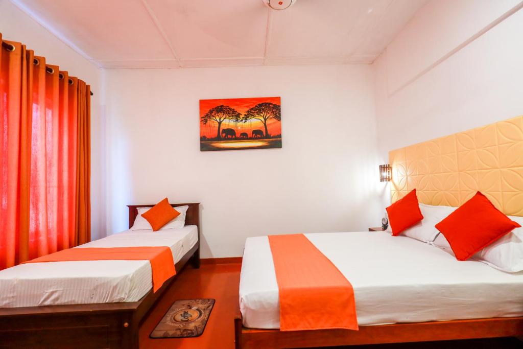 Postel nebo postele na pokoji v ubytování Regent Residencies - Colombo