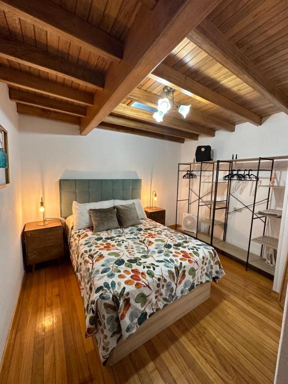เตียงในห้องที่ Cuberto da Parrula