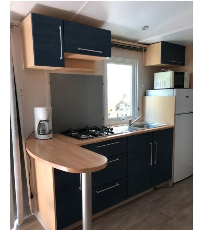 Kuchyň nebo kuchyňský kout v ubytování MOBILE HOME OLIVIER
