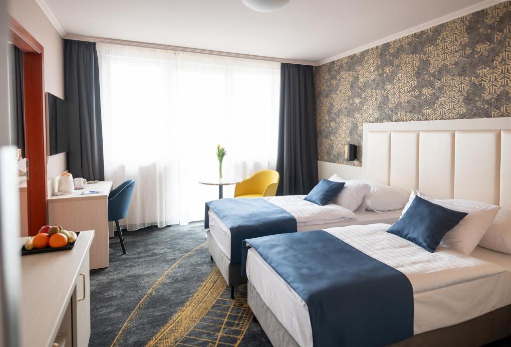 Posteľ alebo postele v izbe v ubytovaní Airport Hotel Budapest