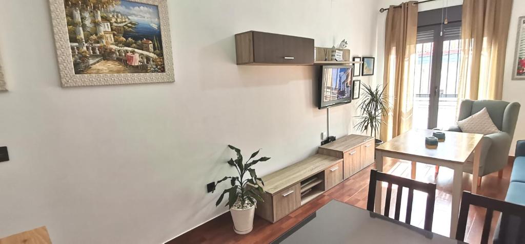 TV a/nebo společenská místnost v ubytování Delux Center Punta Umbría