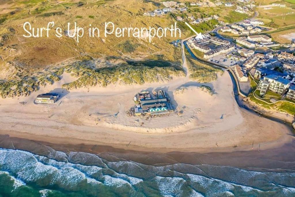 an aerial view of a resort on the beach at Surf's Up in Perranporth, Cornwall Coastal Holidays in Perranporth