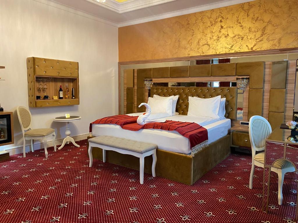 Postel nebo postele na pokoji v ubytování Vila Imperial One Luxury Boutique Hotel