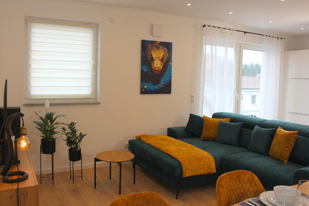 Posezení v ubytování Apartment mit voll ausgestatetter Küche, Badewanne, Balkon, Parkplatz vor dem Haus, ruhig gelegen, ADA4
