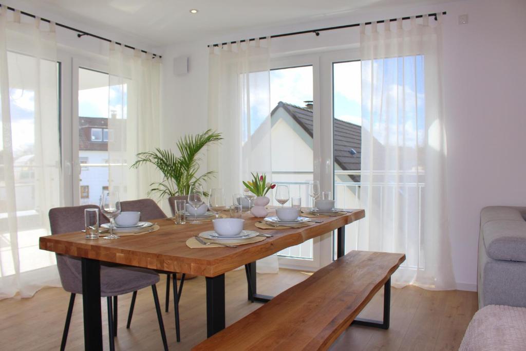 Posezení v ubytování Apartment mit voll ausgestatetter Küche, Badewanne, Balkon, Parkplatz vor dem Haus, ruhig gelegen, ADA4