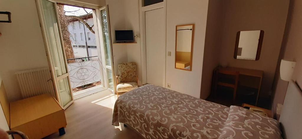 Postel nebo postele na pokoji v ubytování Albergo Centrale