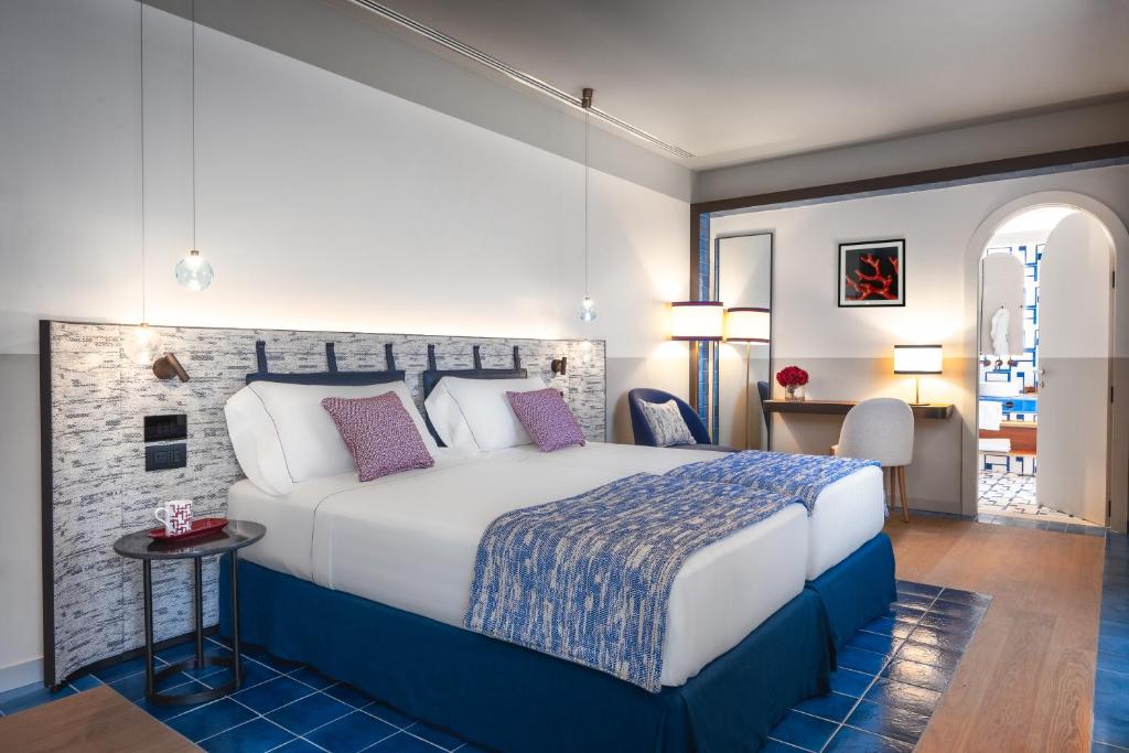 Postel nebo postele na pokoji v ubytování Ara Maris Hotel & Spa