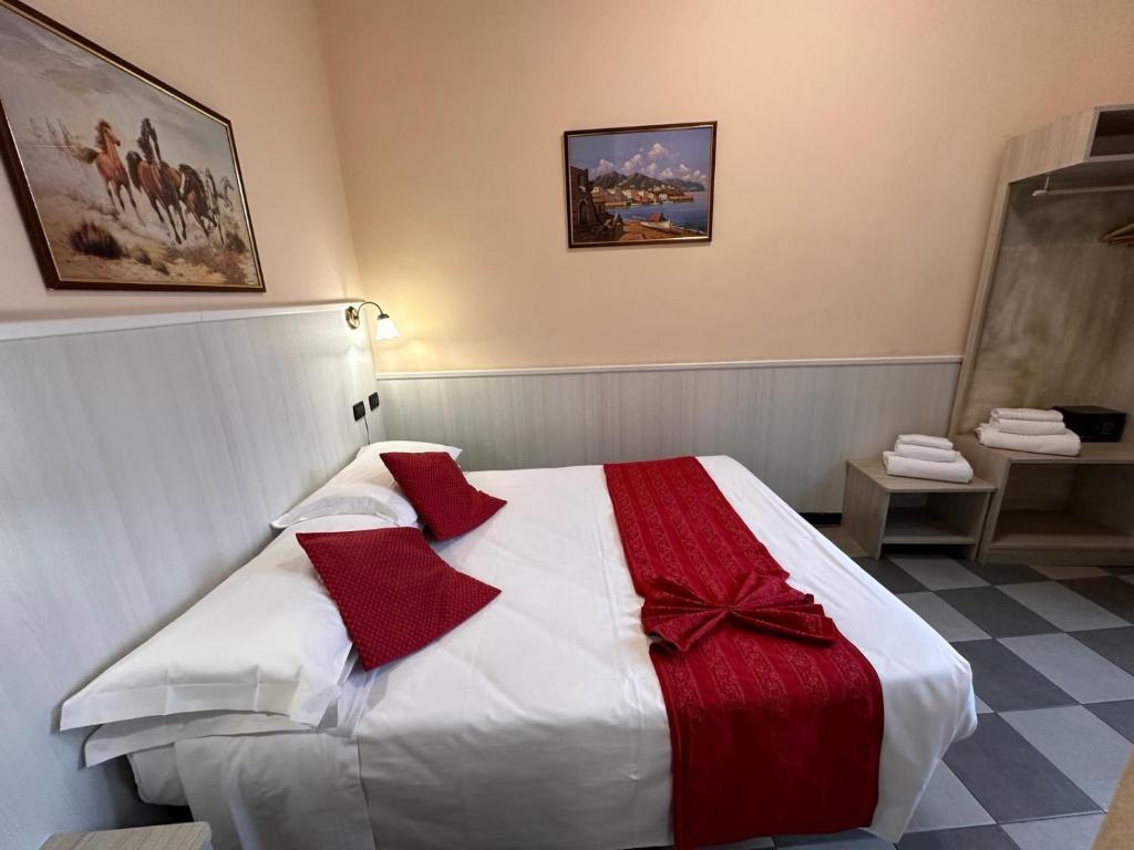Postel nebo postele na pokoji v ubytování Hotel Galata