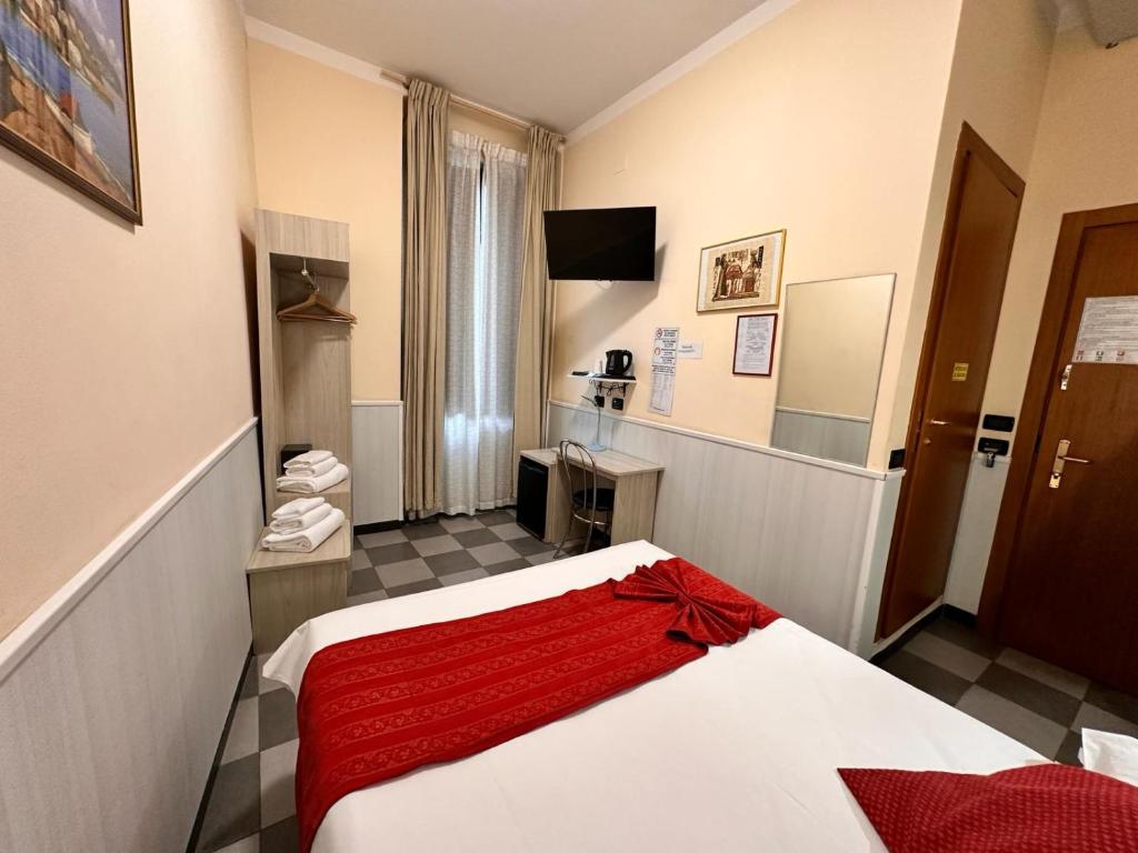 Postel nebo postele na pokoji v ubytování Hotel Galata