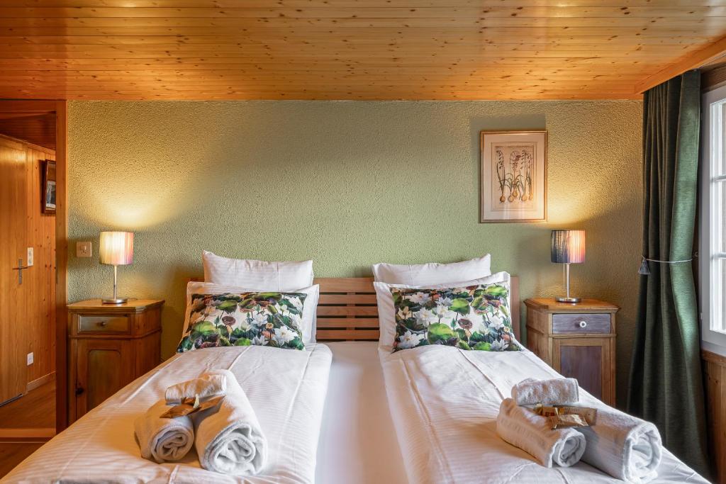 Postel nebo postele na pokoji v ubytování Chalet Schweizerhof Attic