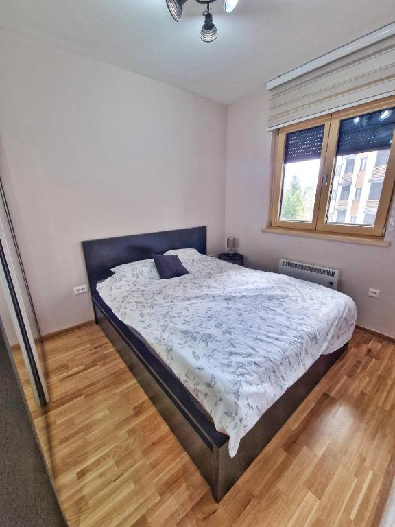 Postel nebo postele na pokoji v ubytování GOFD Apartman Zlatibor