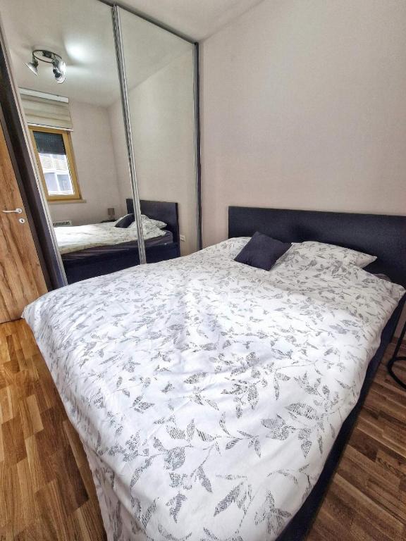 Postel nebo postele na pokoji v ubytování GOFD Apartman Zlatibor