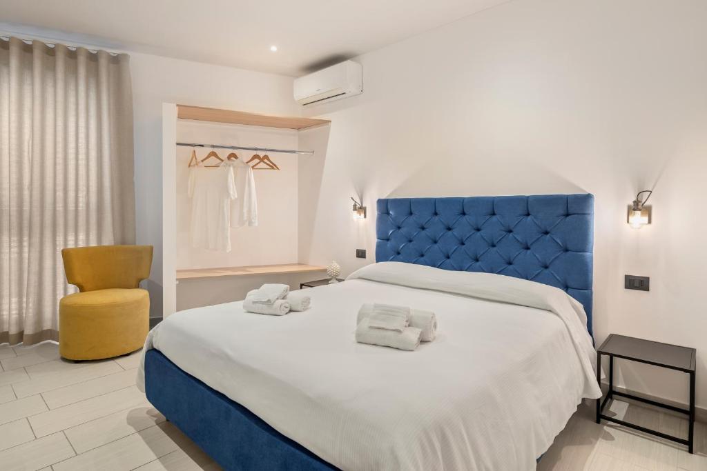 Postel nebo postele na pokoji v ubytování B&B Casa Giunchiglia