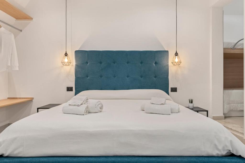 Postel nebo postele na pokoji v ubytování B&B Casa Giunchiglia