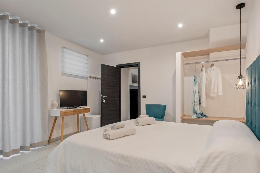 Postel nebo postele na pokoji v ubytování B&B Casa Giunchiglia