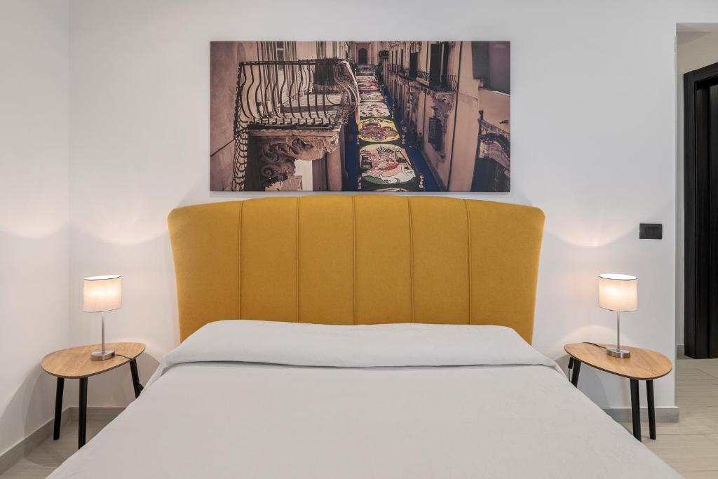 Postel nebo postele na pokoji v ubytování B&B Casa Giunchiglia