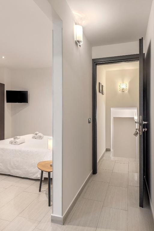 Postel nebo postele na pokoji v ubytování B&B Casa Giunchiglia