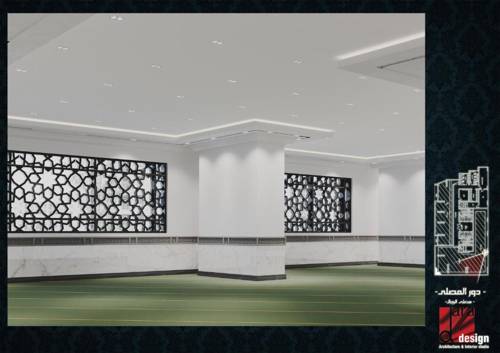 Awan Al Nagah Hotel في مكة المكرمة: غرفة بجدران بيضاء وأرضية خضراء