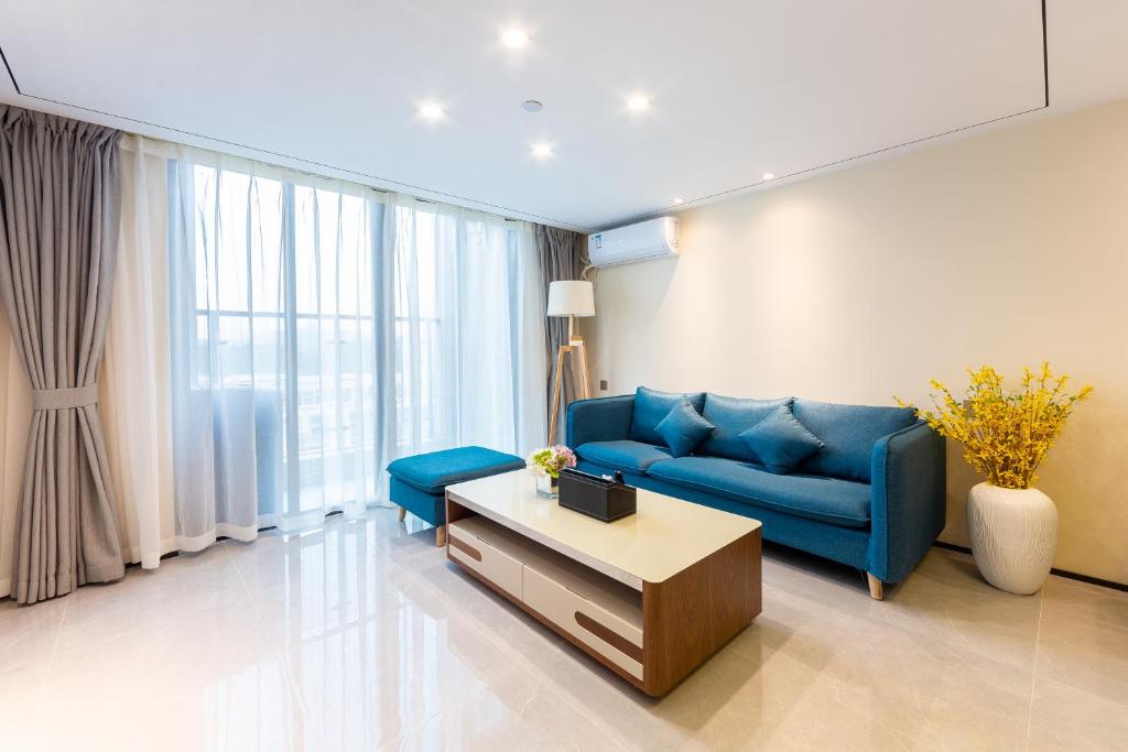 Posezení v ubytování Serveyou International Apartment - Free Airport Pickup & Free Canton Fair Shuttle Bus