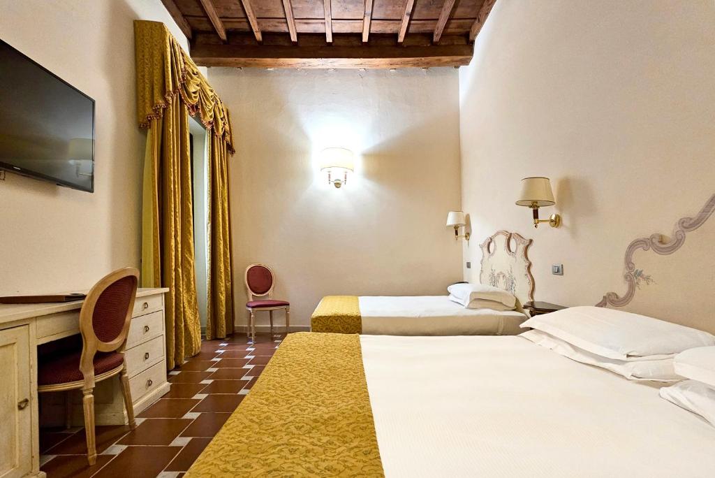 Postel nebo postele na pokoji v ubytování Hotel Atlantic Palace