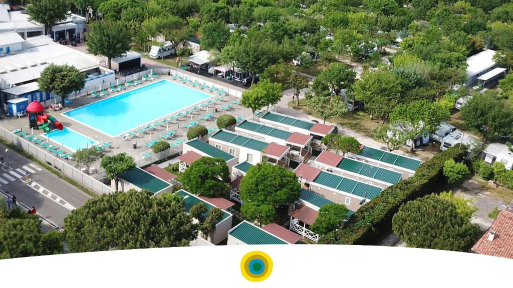 an overhead view of a resort with a swimming pool at Adriatico Family Camping Village in Cervia