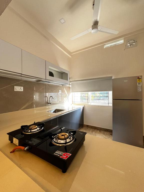 Kuchyň nebo kuchyňský kout v ubytování Avalon Homes