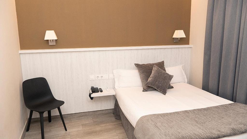 Postel nebo postele na pokoji v ubytování Hotel Coronado