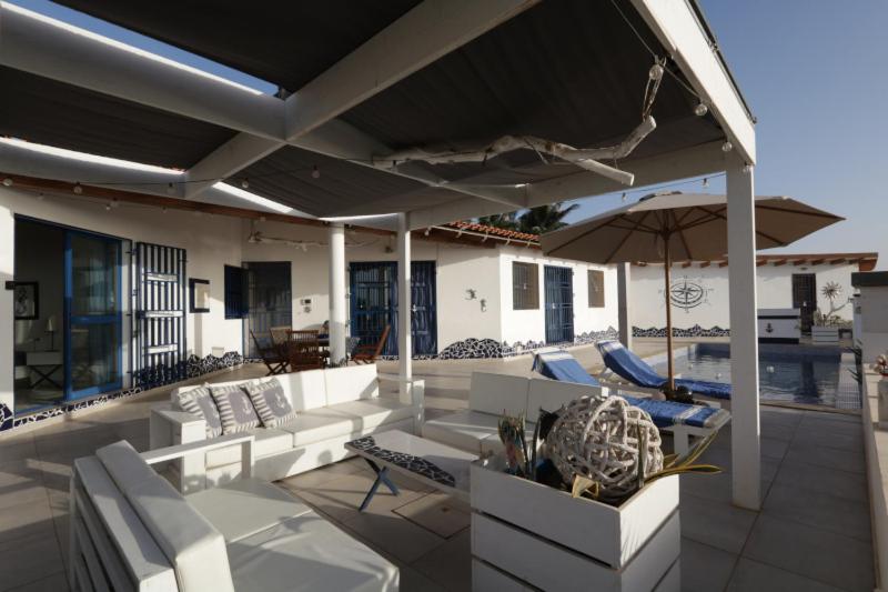 Posezení v ubytování L' Ancora - Room With Exclusive Pool And Terrace
