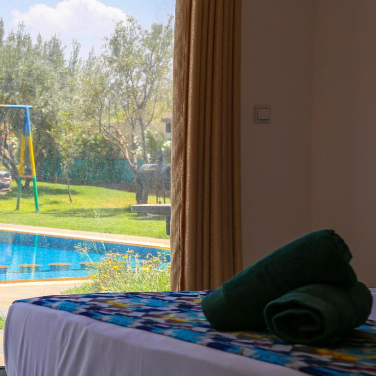 Bazén v ubytování Hotel Jnane riad nebo v jeho okolí