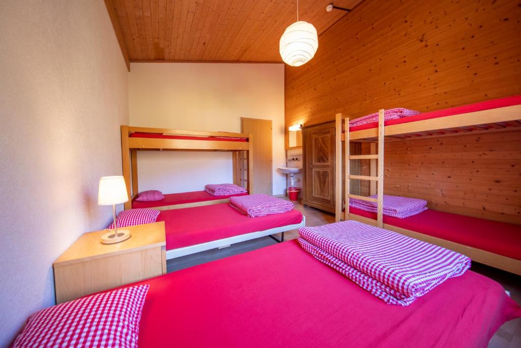 Postel nebo postele na pokoji v ubytování Simons Herberge