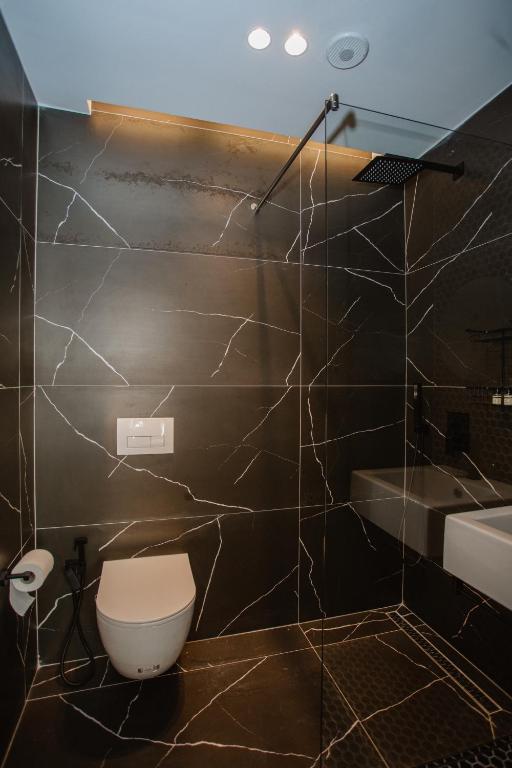 Koupelna v ubytování Hotel Flaer