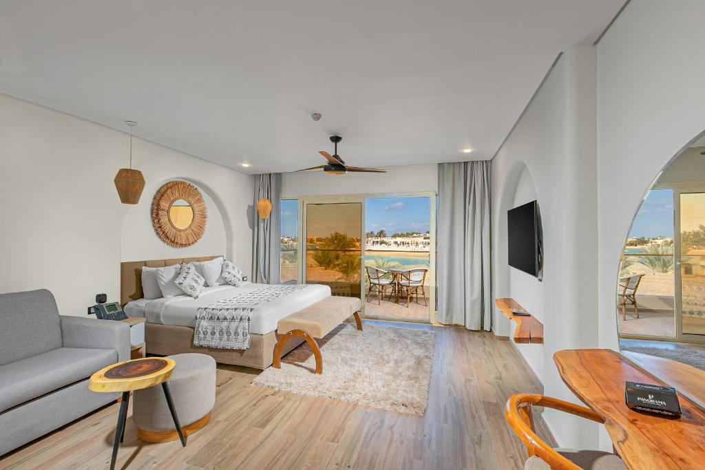 Postel nebo postele na pokoji v ubytování Panorama Bungalows Resort El Gouna
