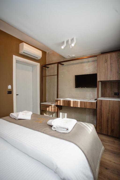 Postel nebo postele na pokoji v ubytování Hotel Flaer