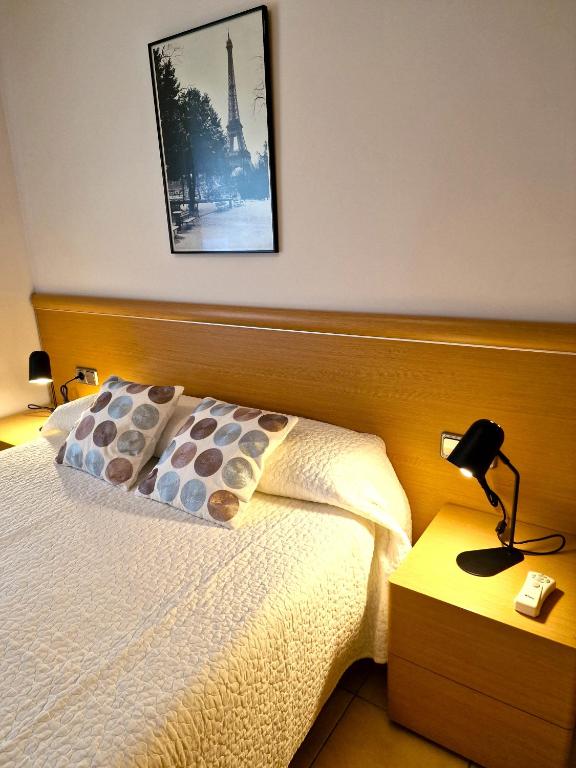 Postel nebo postele na pokoji v ubytování Sierco Apartamentos Ainsa