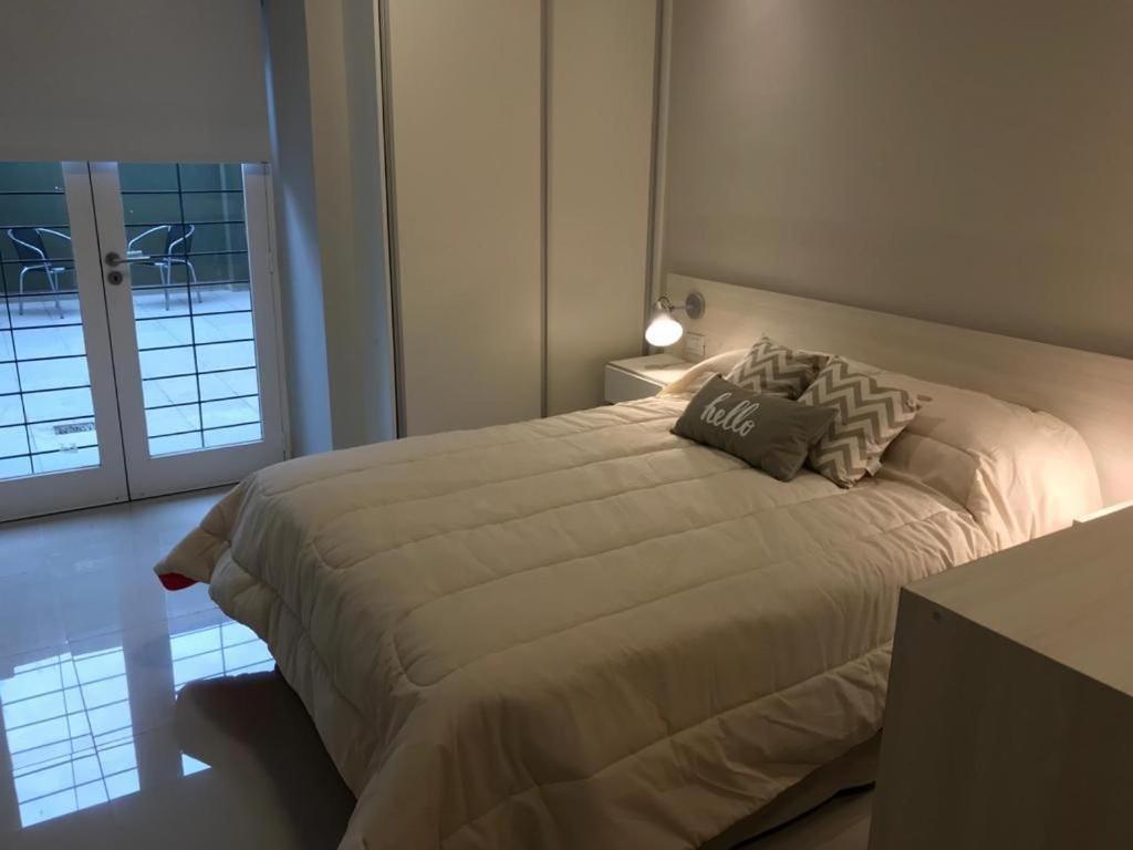 מיטה או מיטות בחדר ב-Dto monoambiente