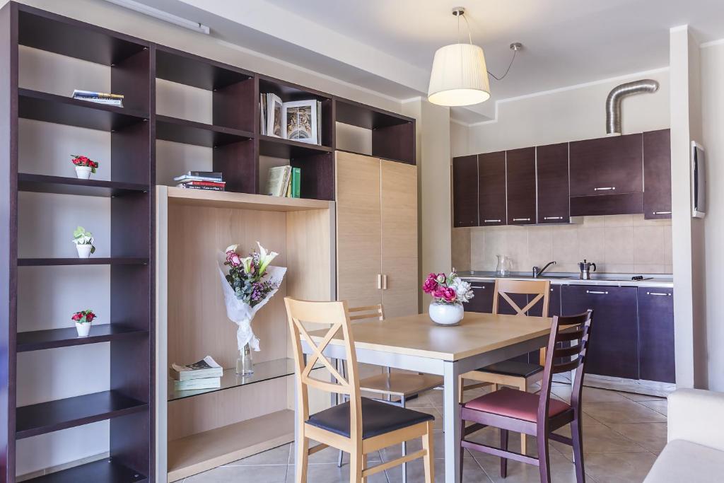 Kuchyň nebo kuchyňský kout v ubytování ApartHotel Anghel