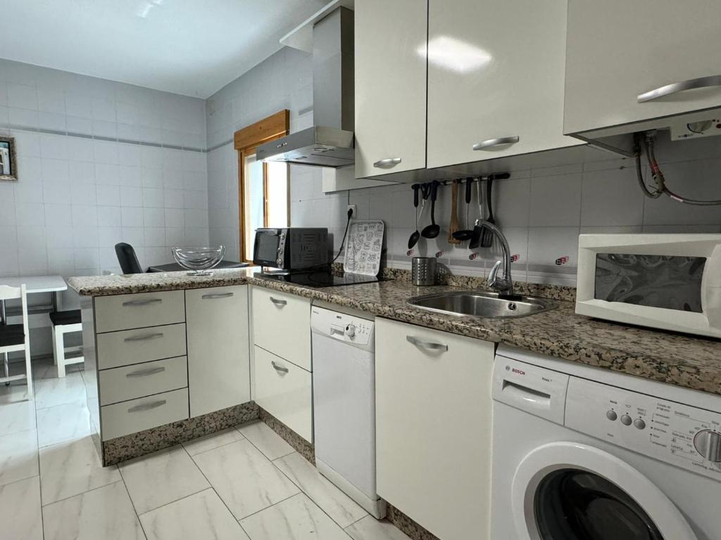 Kuchyňa alebo kuchynka v ubytovaní Apartamento Algafequi con terraza privada