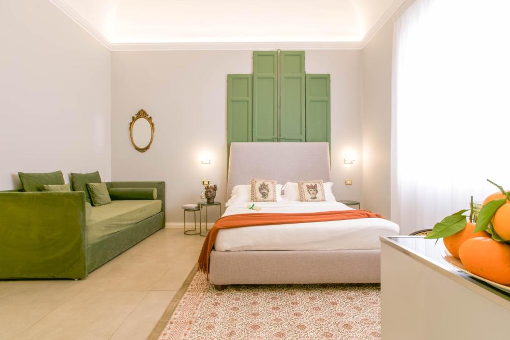 Family Affair Luxury Rooms&Suitesにあるベッド