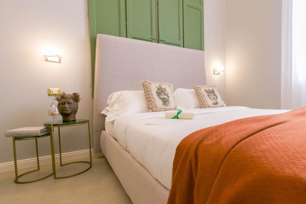 Family Affair Luxury Rooms&Suitesにあるベッド