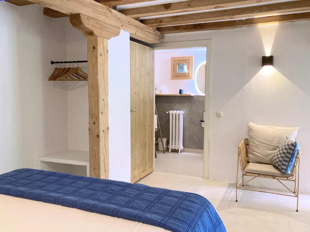 Postel nebo postele na pokoji v ubytování Mañarinegi Apartamentos Rurales
