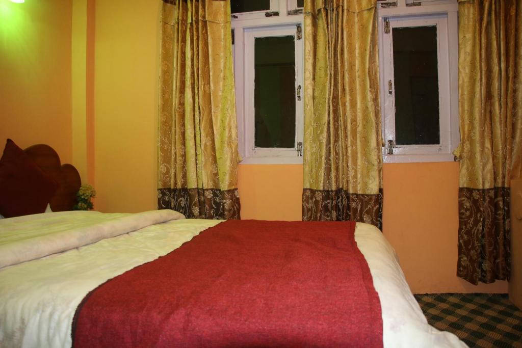 Krevet ili kreveti u jedinici u objektu Hotel Pathibhara