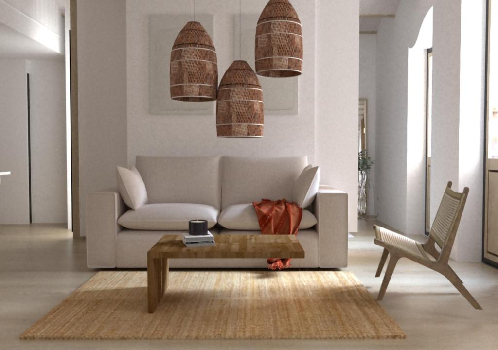 - un salon avec un canapé et une table basse dans l'établissement El Refugi de Girona, à Gérone