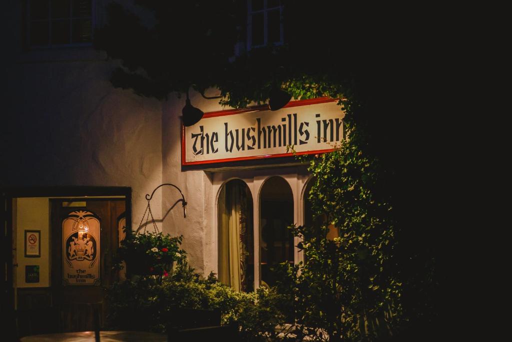a sign on the side of a building at Bushmills Inn Hotel & Restaurant in Bushmills