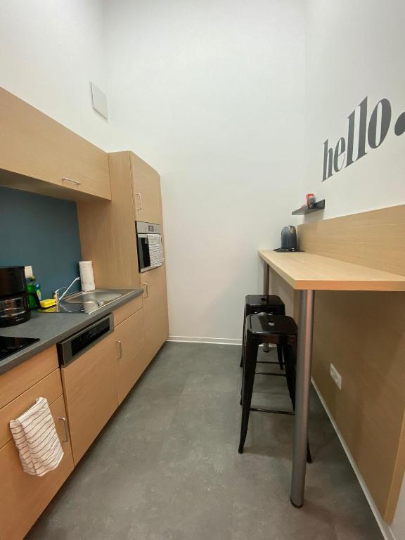 Kuchyň nebo kuchyňský kout v ubytování Fabella Flats Forchheim