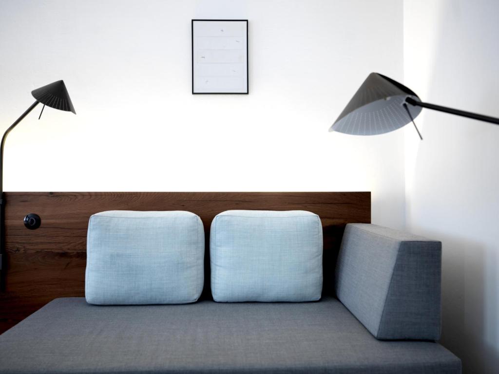 Posteľ alebo postele v izbe v ubytovaní artHotel Blaue Gans