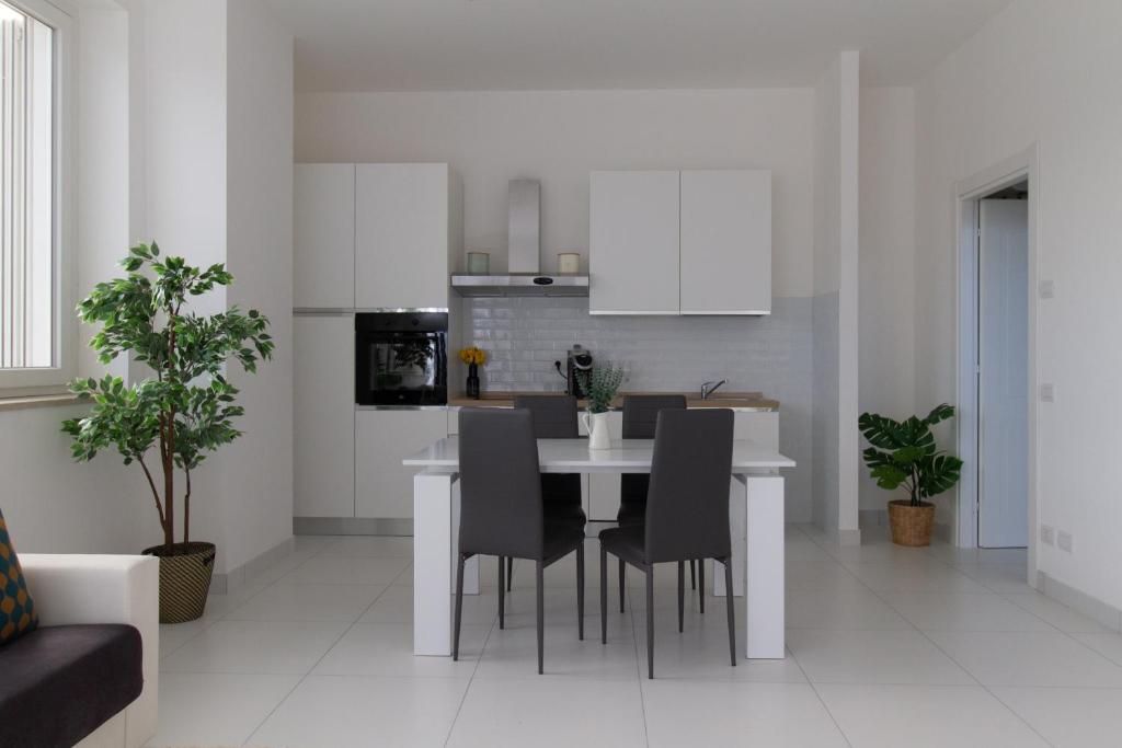 Kuchyň nebo kuchyňský kout v ubytování Sky Suite Blue Pomezia