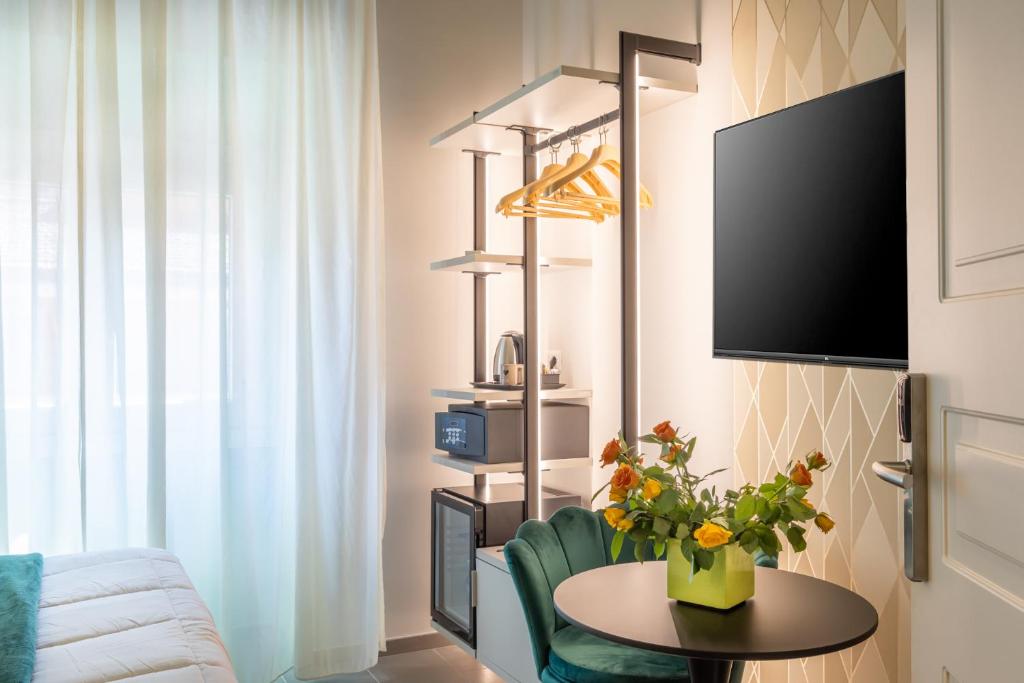 TV a/nebo společenská místnost v ubytování New Morpheus Rooms